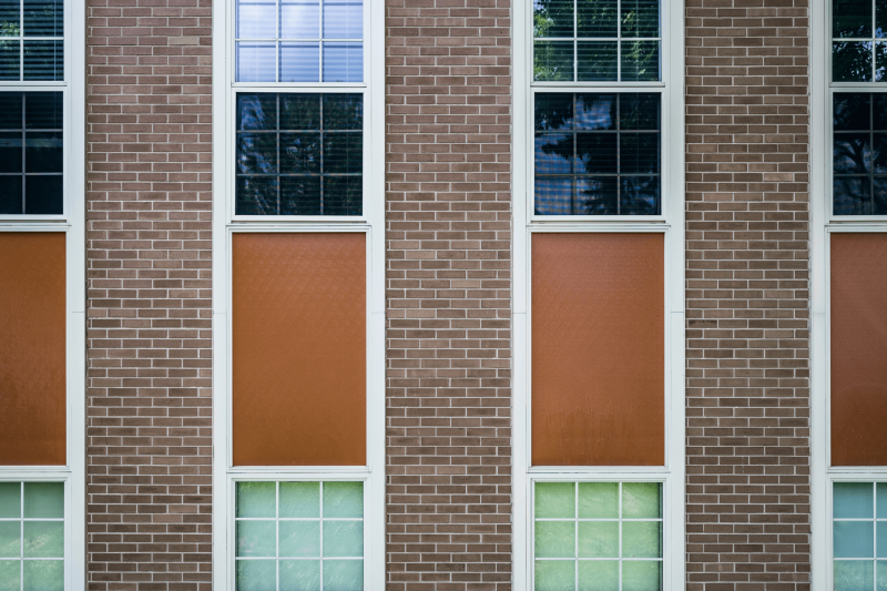 Close up of school building walls and windows.