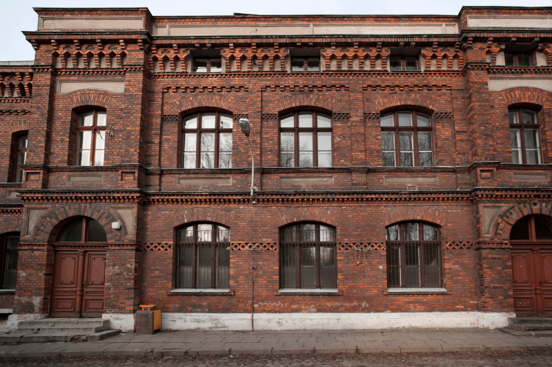 Old, red brick work building. asbestos commercial property