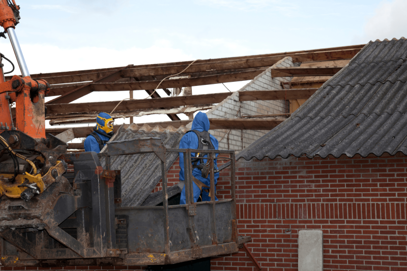 Asbestos removalists removing asbestos from an old home. residential asbestos removal