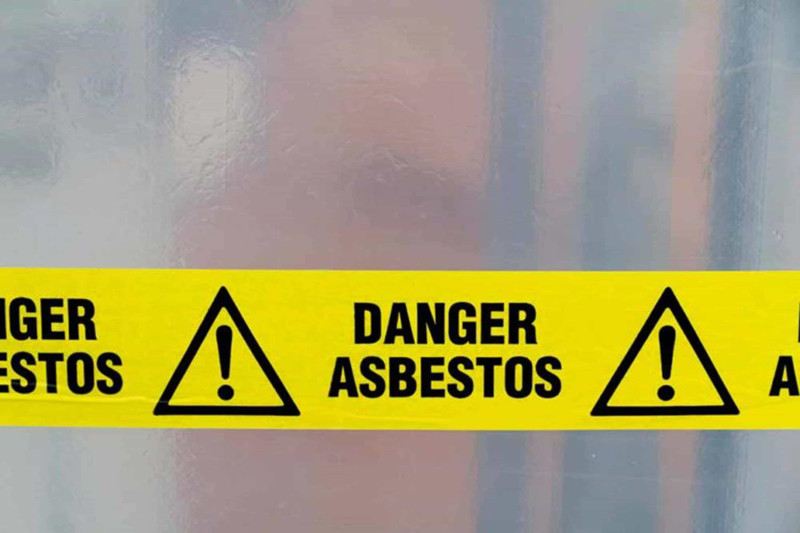 Image of an asbestos disposal in progress sign. friable asbestos & non friable asbestos