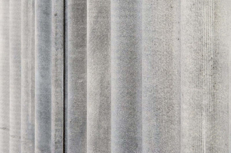 Image of an asbestos fence. asbestos services - asbestos fence removal cost