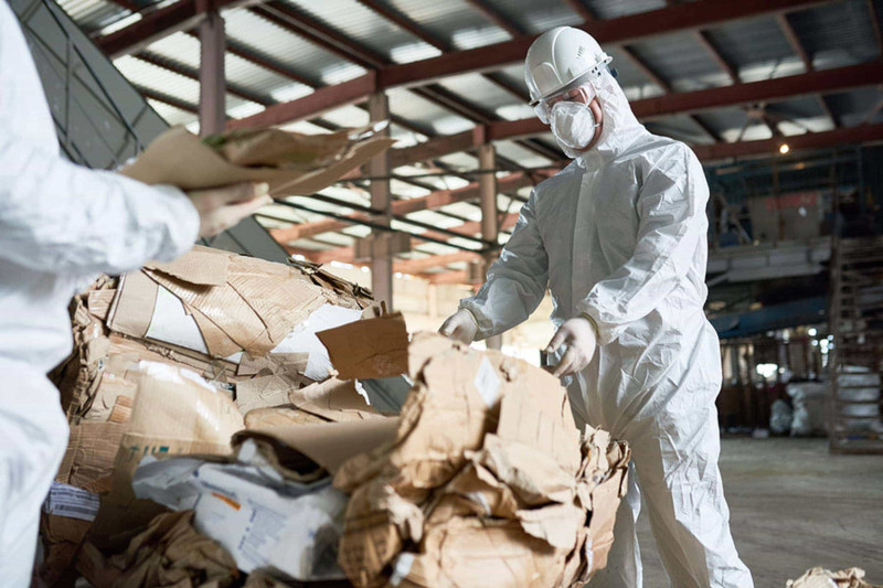 Image of contractors conducted an asbestos removal service. asbestos disposal