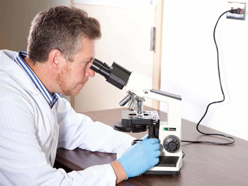 Lab testing asbestos sample.