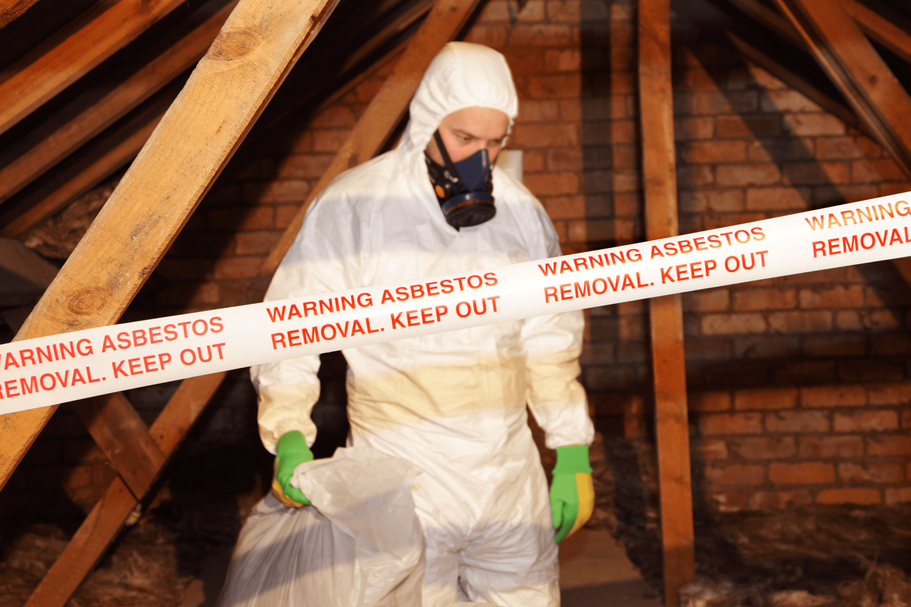 Professional asbestos removal expert on the job. asbestos commercial